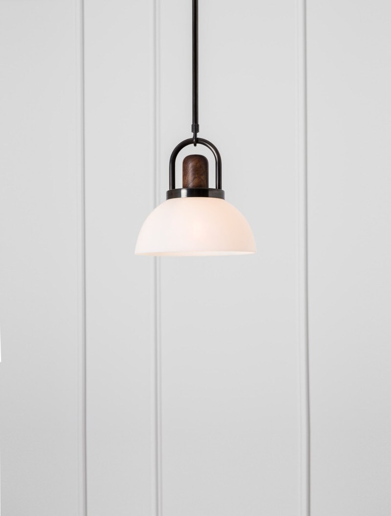 Glass Arc 10" shown in Matte White Glass Dome, Blackened Brass Arc, Black Walnut Socket Cover